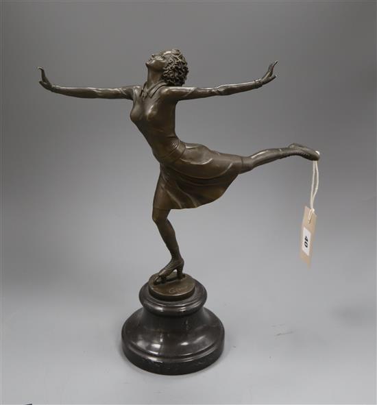 A bronze of an ice skater, on marble, signed Faro height 37cm